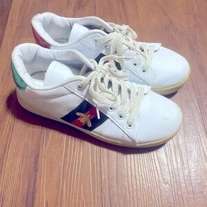 Size 5.5 unisex Gucci shoes.